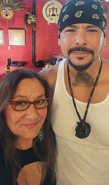 Becky Olvera Schultz with customer Carlos