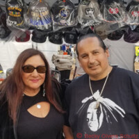 Artist David Wilson Jr. with Becky Olvera Schultz at Stanford Powwow